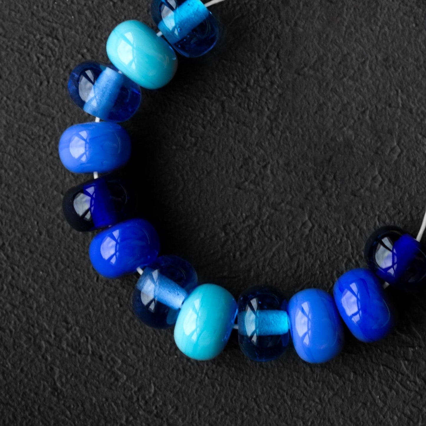 Ocean Blues Lampwork Glass Beads – Handmade Glass Spacer Beads in Aqua, Cobalt, and Sky Blue (Set of 12)